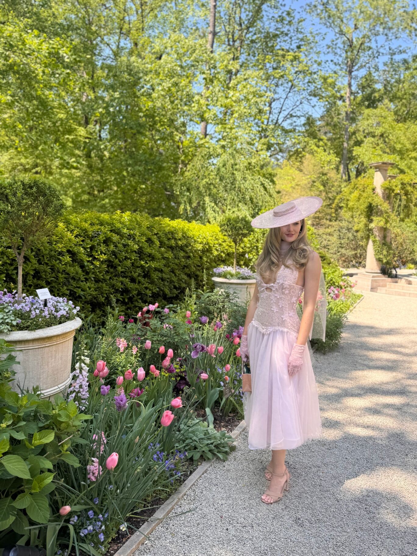 Pale pink lace custom bridal gown with wide-brim hat — Blár Studio, custom bridal USA
